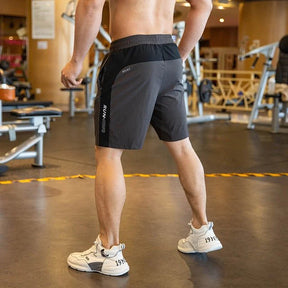 shorts masculino esportivo com bolso , shorts masculino esportivo, shorts masculino, shorts esportivo com bolso, shorts de compressão masculino, shorts de compressão com dois bolsos, shorts de compressão, shorts de compressão esportivo diversas cinza